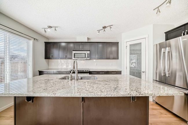 212 Autumn Green Se, House other with 3 bedrooms, 3 bathrooms and 2 parking in Calgary AB | Image 5