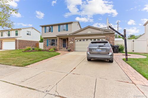 21849 E Chipmunk Trl, Woodhaven, MI, 48183-1507 | Card Image