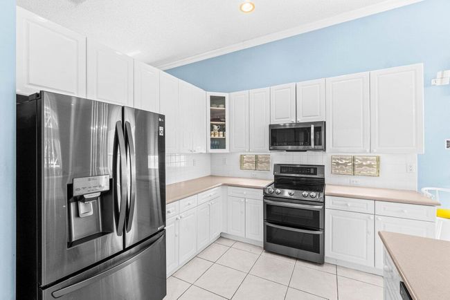 5946 Bay Hill Cir, House other with 4 bedrooms, 2 bathrooms and null parking in Lake Worth FL | Image 16