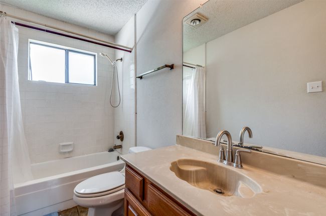 Upstairs hall bath. | Image 17
