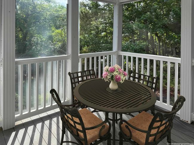 Sunroom with outdoor dining space and plenty of natural light | Image 18