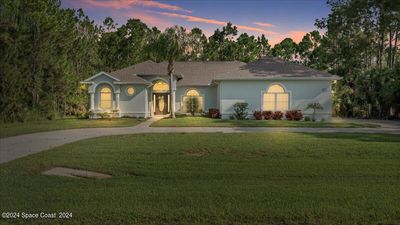 3064 Green Turtle Circle, House other with 4 bedrooms, 3 bathrooms and null parking in Mims FL | Image 1