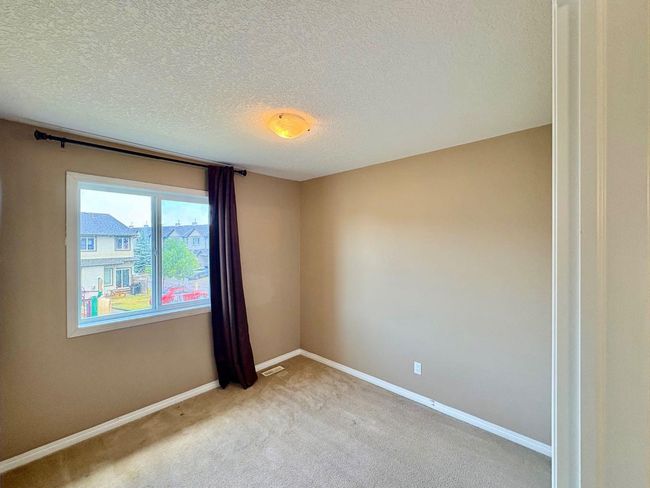 703 - 620 Luxstone Landing Sw, Townhouse with 3 bedrooms, 3 bathrooms and 2 parking in Airdrie AB | Image 19