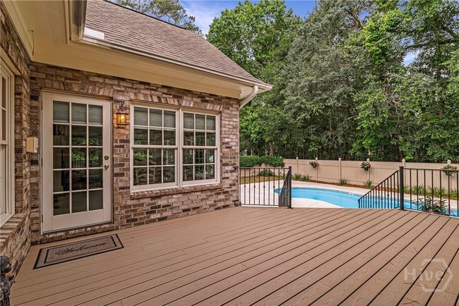 New TREX deck off of the sunroom | Image 15