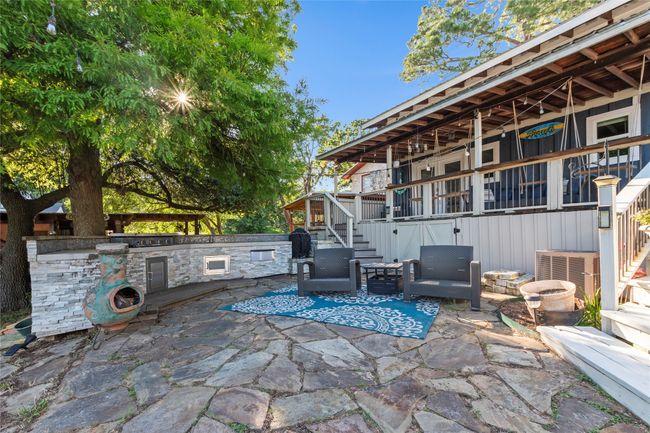 Both homes connected and over look Flagstone patio with outdoor kitchen | Image 26