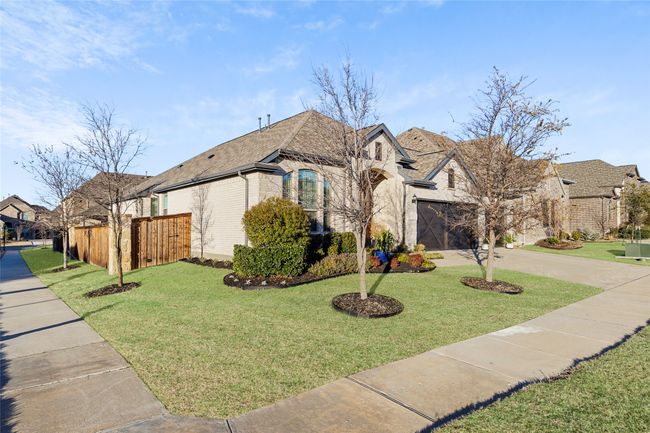 Stunning home is situated on large, corner lot | Image 4