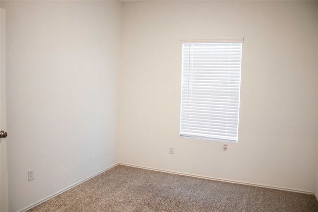 Bedroom #2 Unfurnished room with carpet flooring and baseboards | Image 5