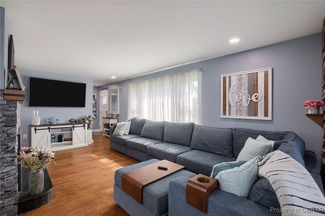 Living room with wood-type flooring | Image 28