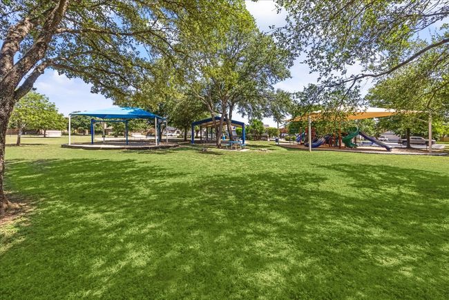 View of home's community featuring playground community, a gazebo, and a yard | Image 30