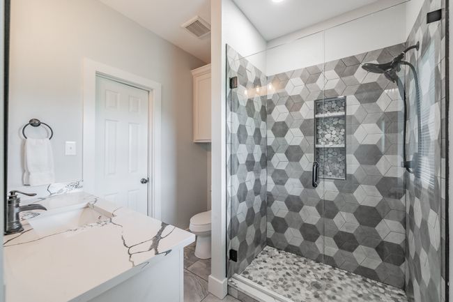 Full bath with vanity, toilet, and a shower stall | Image 31
