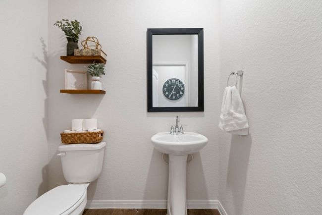 Half bathroom with wood finished floors and toilet | Image 5