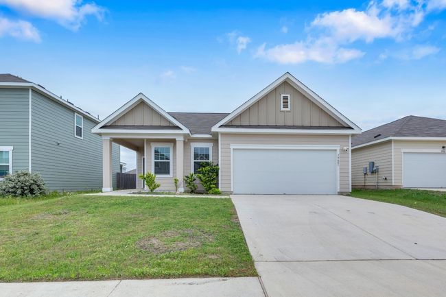The home’s clean lines and modern design make a lasting first impression from the street. | Image 8