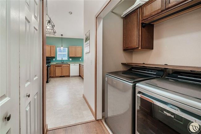 Hallway and laundry area | Image 12