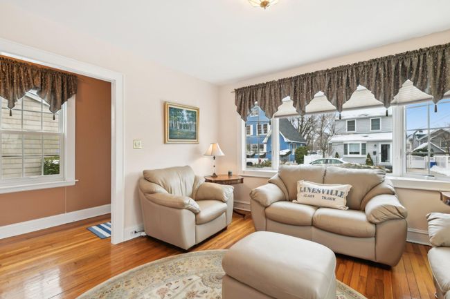 Living room featuring hardwood / wood-style floors | Image 4