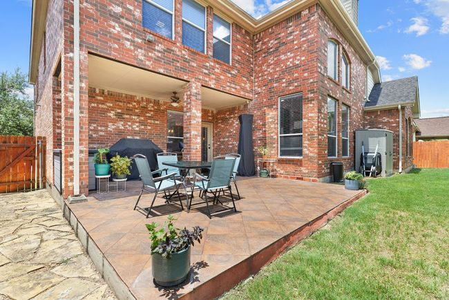 Extended patio allows for hosting friends and family under the Texas sky. | Image 35