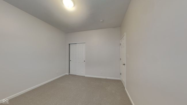 unfurnished room with baseboards and light carpet | Image 12