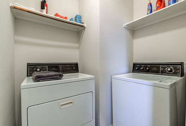 Laundry area featuring washer and dryer | Image 13