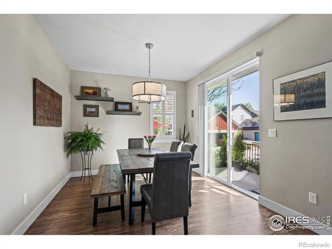 Dining room with door to patio | Image 11