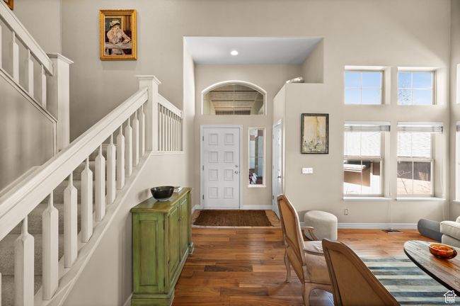 Foyer with stairway, a high ceiling, and dark wood-style floors | Image 5