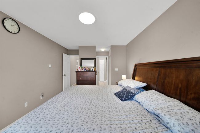 Bedroom with baseboards | Image 13
