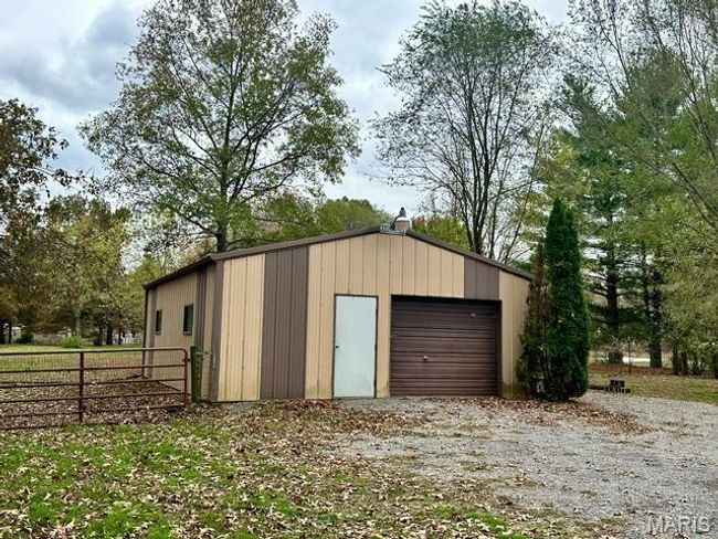 View of outbuilding featuring a garage | Image 10