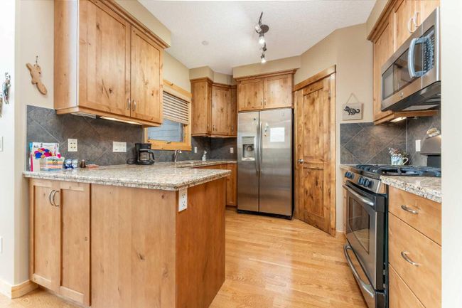 321 - 107 Armstrong Place, Home with 2 bedrooms, 2 bathrooms and 2 parking in Canmore AB | Image 5