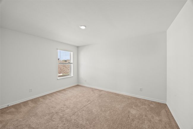 Spare room featuring light colored carpet and baseboards | Image 29