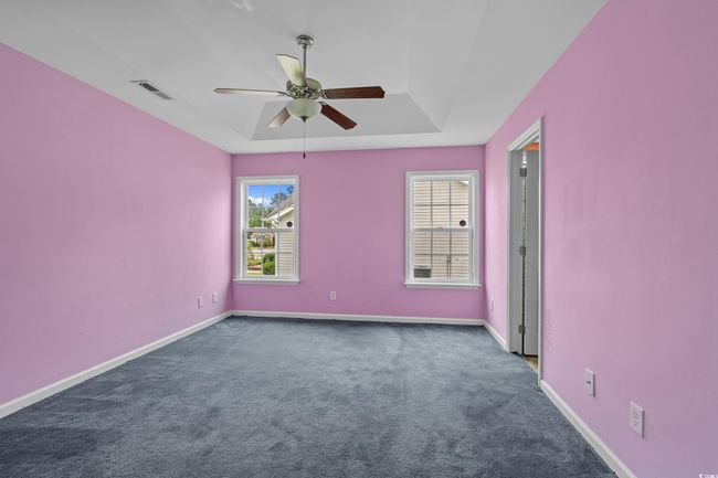 Empty room featuring ceiling fan, carpet flooring, and baseboards | Image 27
