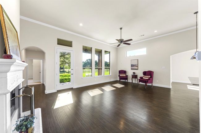 View from Entry Way and check out those long picture windows revealing the beautiful backyard! | Image 9