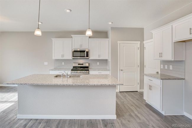7702 E 159 Th Ave, House other with 5 bedrooms, 3 bathrooms and 3 parking in Thornton CO | Image 12