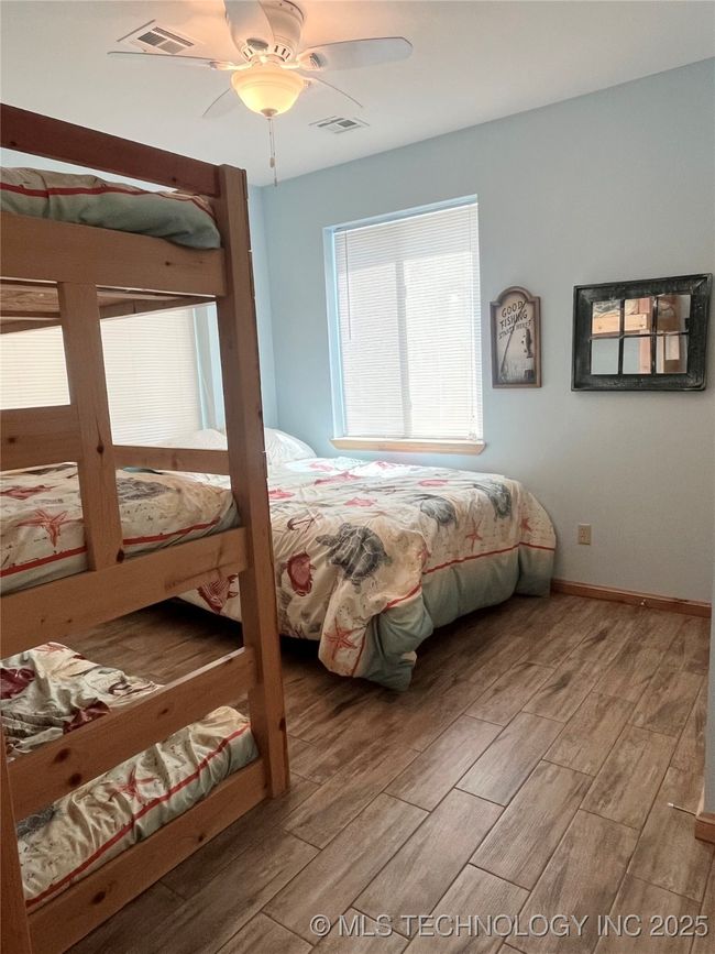 Bedroom 4 with twin bunk beds and full bed | Image 21