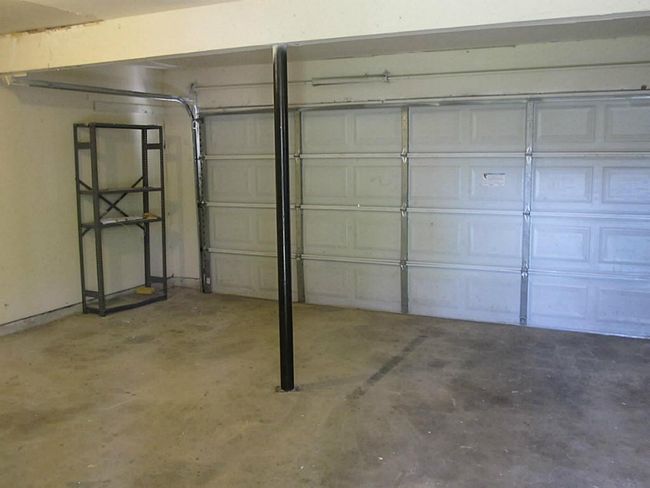 large NEW 2023 2 car garage w recent metal door | Image 15