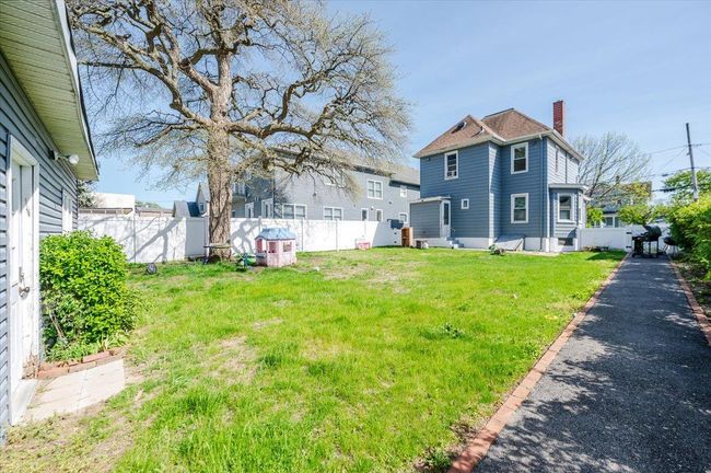 View of yard featuring a fenced backyard | Image 20