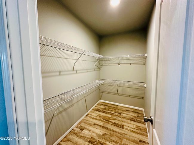Walk in closet by bonus room | Image 23