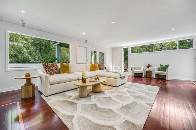 Living room with ornamental molding and dark hardwood / wood-style flooring | Image 14