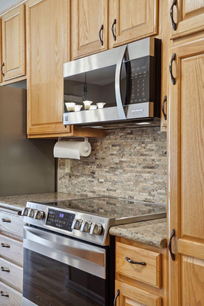 Beautiful, stone backsplash! | Image 15