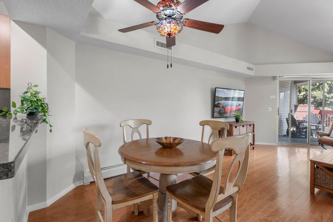 View from the dining room highlighting the open-concept layout. | Image 6