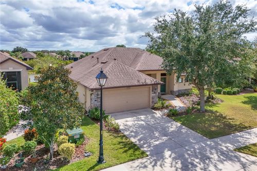 8860 Bridgeport Bay Cir, MOUNT DORA, FL, 32757-8856 | Card Image