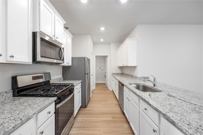 Kitchen with upgraded Whirlpool kitchen appliances. | Image 2