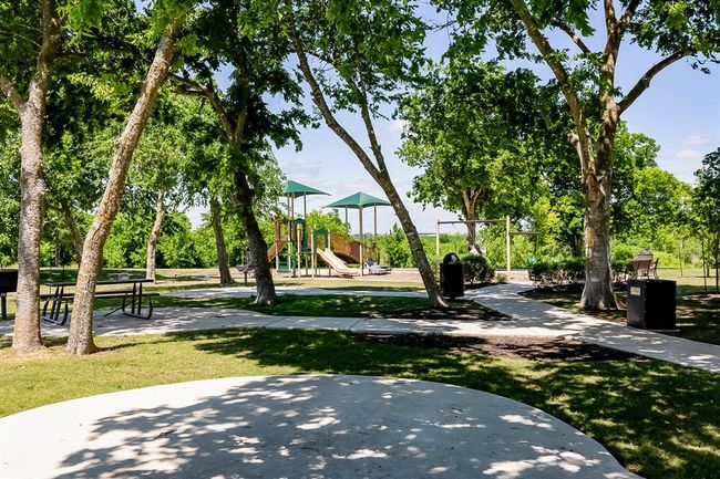 Surrounding community with a yard | Image 29