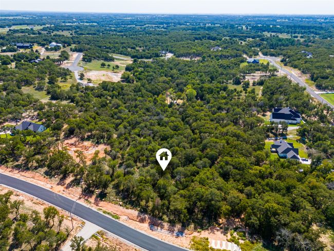 Aerial view of a heavily wooded area | Image 15