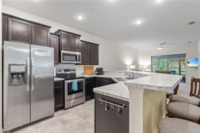 102 - 590 Remington Green Drive Se, Home with 2 bedrooms, 2 bathrooms and null parking in Palm Bay FL | Image 3