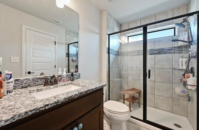 2nd Full bathroom featuring vanity, a shower stall, and tile patterned floors | Image 22