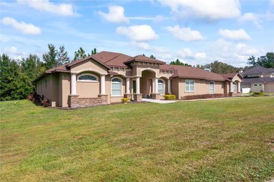 13102 Done Groven Drive, House other with 4 bedrooms, 3 bathrooms and null parking in Dover FL | Image 3