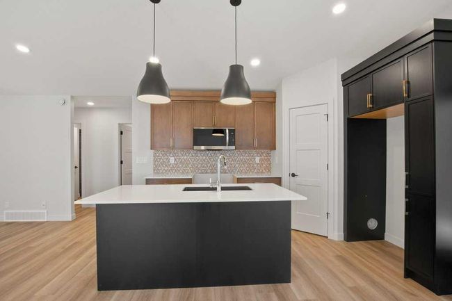 154 Norseman Close, House other with 4 bedrooms, 3 bathrooms and 4 parking in Penhold AB | Image 4