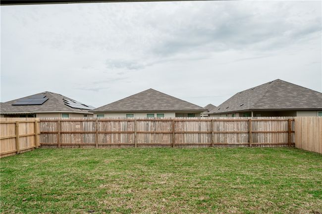 View of yard featuring a fenced backyard | Image 23