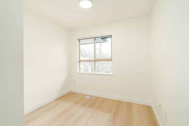 Unfurnished room featuring baseboards, light wood-type flooring, and visible vents | Image 30