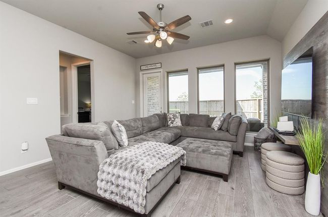 8' Doors with lots of natural light fill this home. | Image 16