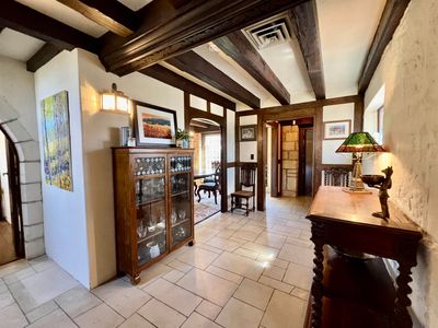 Interior space featuring beamed ceiling and tile flooring | Image 2