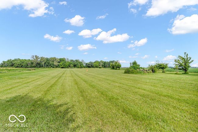 view of green lawn featuring a rural view | Image 50